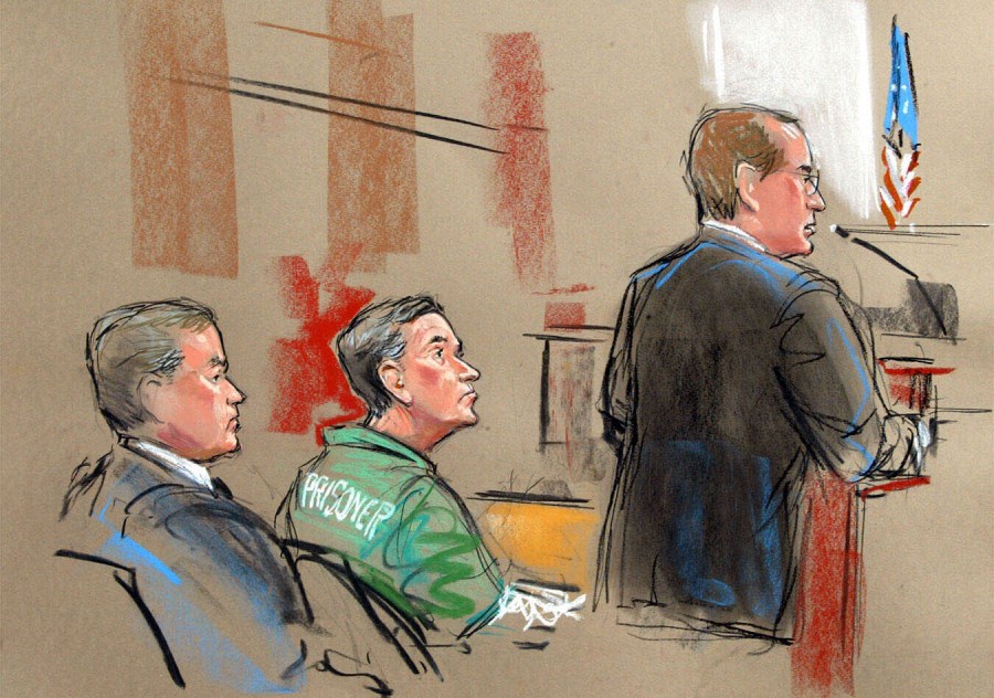 FILE - In this artist depiction, U.S. Attorney Randy Bellows, right, addresses the court during the sentencing of convicted spy Robert Hanssen, center, seen with his attorney Plato Cacheris, left, at the federal courthouse in Alexandria, Va., May 10, 2002. Hanssen was given a life sentence. The former FBI agent who took more than $1.4 million in cash and diamonds to trade secrets with Russia and the former Soviet Union in one of the most notorious spying cases in American history has died in prison.(William Hennessy, Jr. via AP)