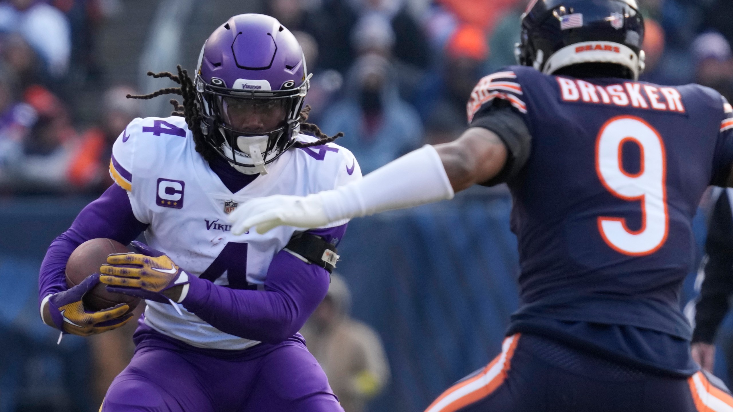 FILE - Minnesota Vikings running back Dalvin Cook runs against the Chicago Bears during the first half of an NFL football game on Jan. 8, 2023, in Chicago. The Minnesota Vikings are parting ways with the star running back for salary cap savings after his fourth consecutive season surpassing the 1,000-yard rushing mark. Cook has been informed he will be released, a person familiar with the team’s decision told The Associated Press on Thursday, June 8. (AP Photo/Nam Y. Huh, File)