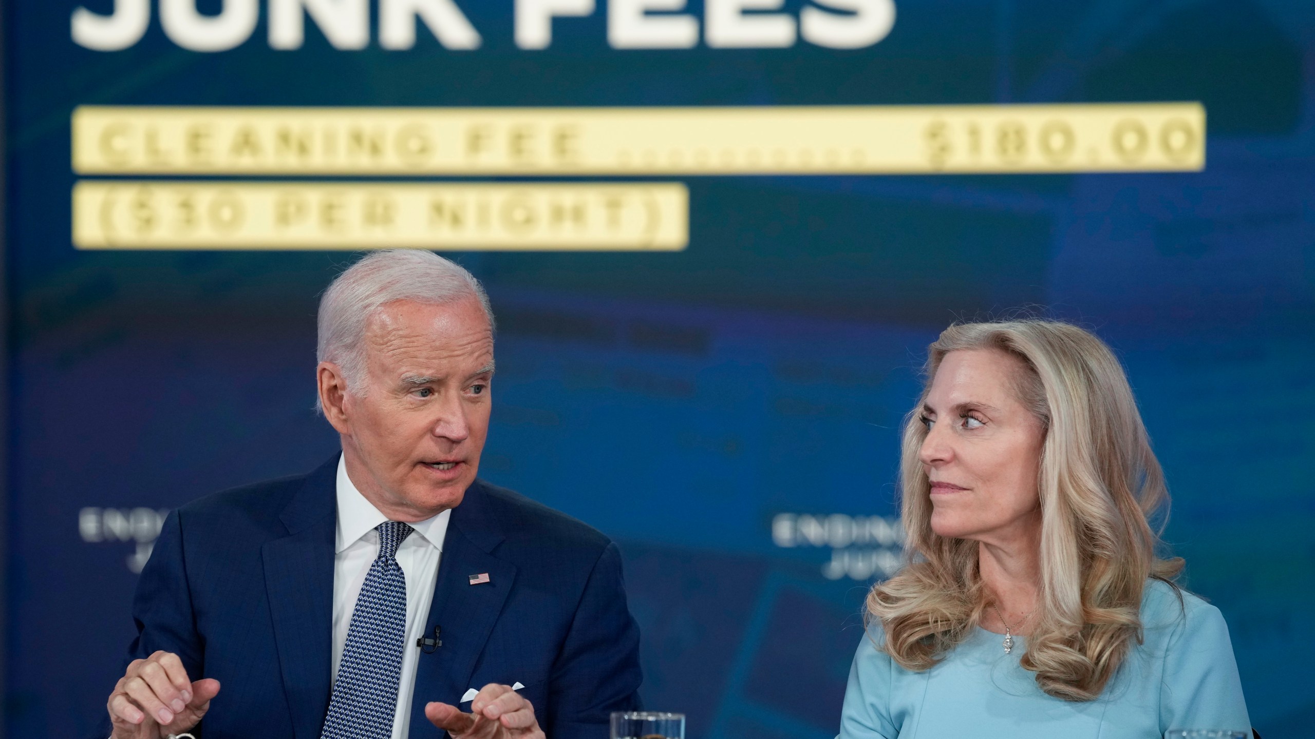 President Joe Biden speaks in the South Court Auditorium on the White House complex in Washington, Thursday, June 15, 2023, to highlight his administration's push to end so-called junk fees that surprise customers. Lael Brainard, Assistant to the President and Director of the National Economic Council, listens at right. (AP Photo/Susan Walsh)