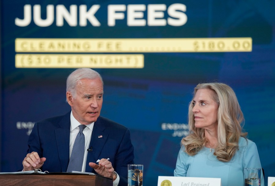 President Joe Biden speaks in the South Court Auditorium on the White House complex in Washington, Thursday, June 15, 2023, to highlight his administration's push to end so-called junk fees that surprise customers. Lael Brainard, Assistant to the President and Director of the National Economic Council, listens at right. (AP Photo/Susan Walsh)