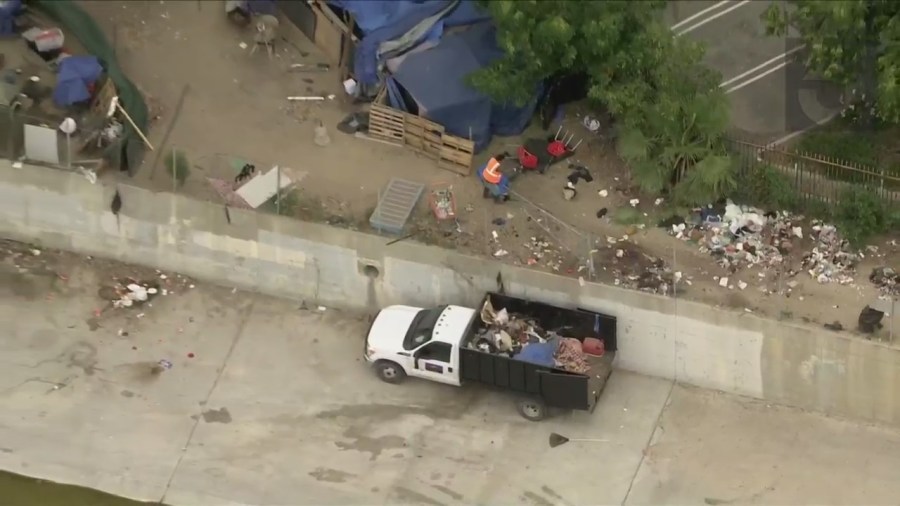 A homeless encampment near the Chatsworth Metrolink station, shown on June 1, 2023, has riled residents. (KTLA)