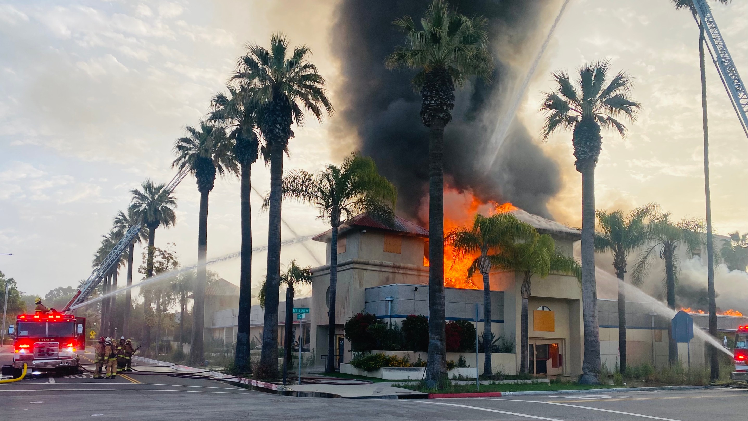 Two men were arrested for allegedly setting fire to a city-owned building in Riverside, causing millions of dollars in damages. (Riverside Fire Department)