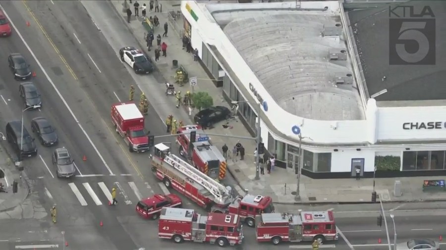 Car hits pedestrians