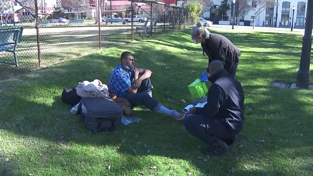 Workers engage in homeless outreach in Pasadena in this file photo. (KTLA)