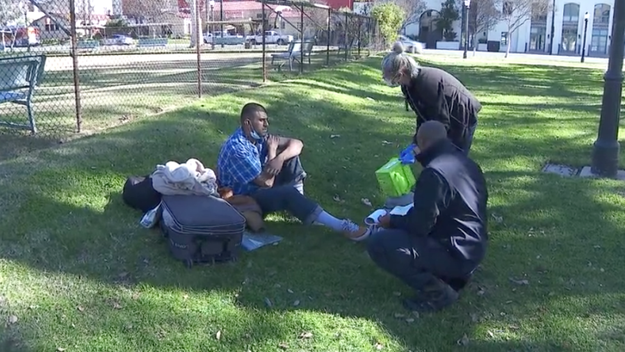 Workers engage in homeless outreach in Pasadena in this file photo. (KTLA)