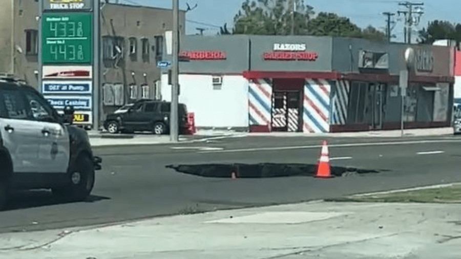 A sinkhole opened up in Long Beach along Pacific Coast Highway on June 3, 2023. (Citizen)