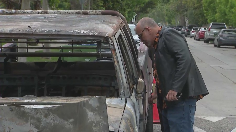 Arsonist torches classic Ford pickup truck in the Fairfax district amid a string of reported fires in the neighborhood on June 7, 2023. (KTLA)