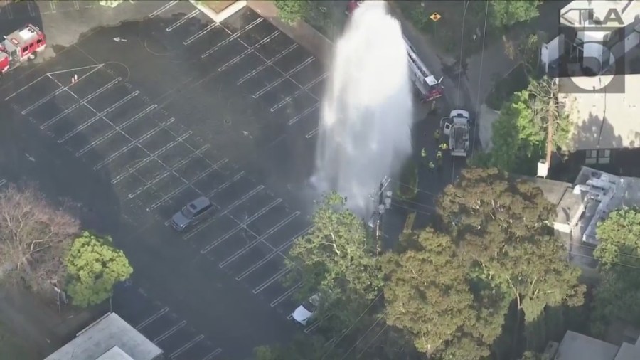 Firefighters responded to a school in Studio City flooded from a sheared hydrant leak on June 13, 2023. (KTLA)