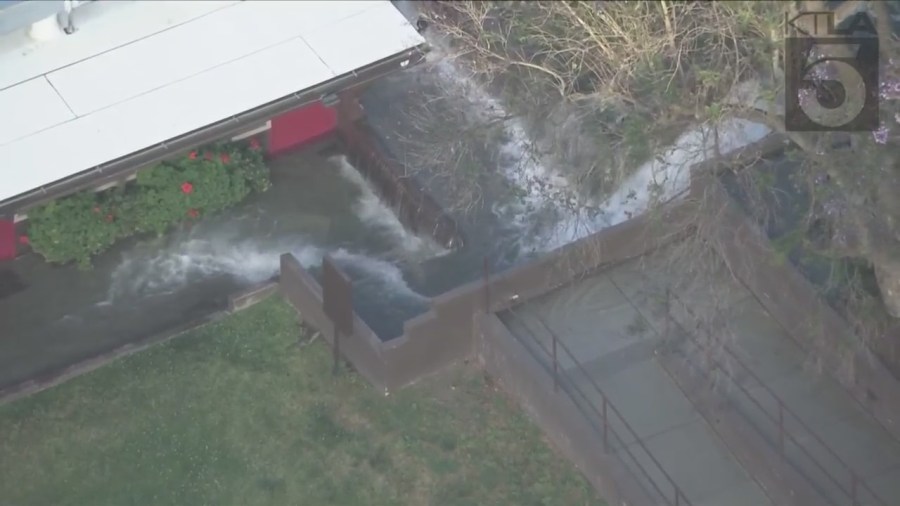 Firefighters responded to a school in Studio City flooded from a sheared hydrant leak on June 13, 2023. (KTLA)