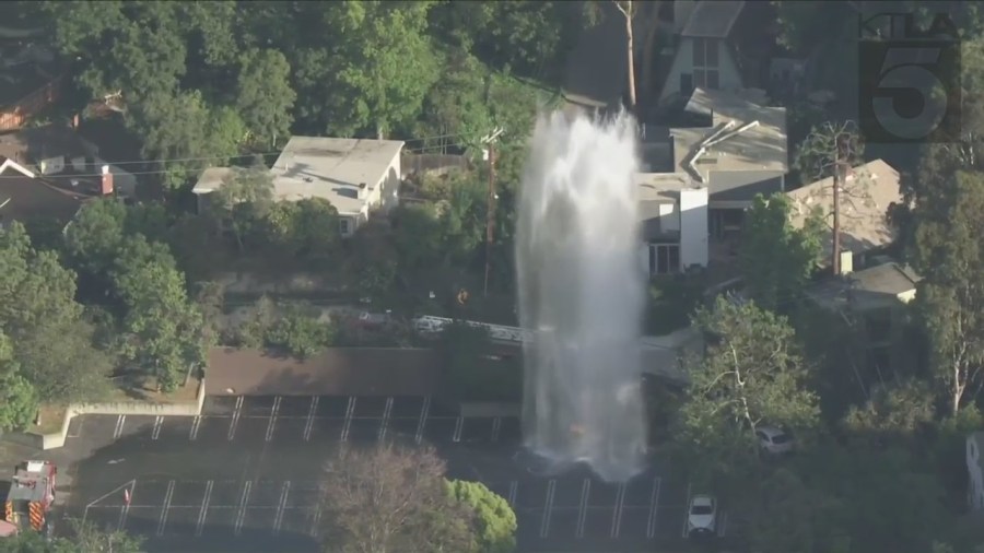 Firefighters responded to a school in Studio City flooded from a sheared hydrant leak on June 13, 2023. (KTLA)