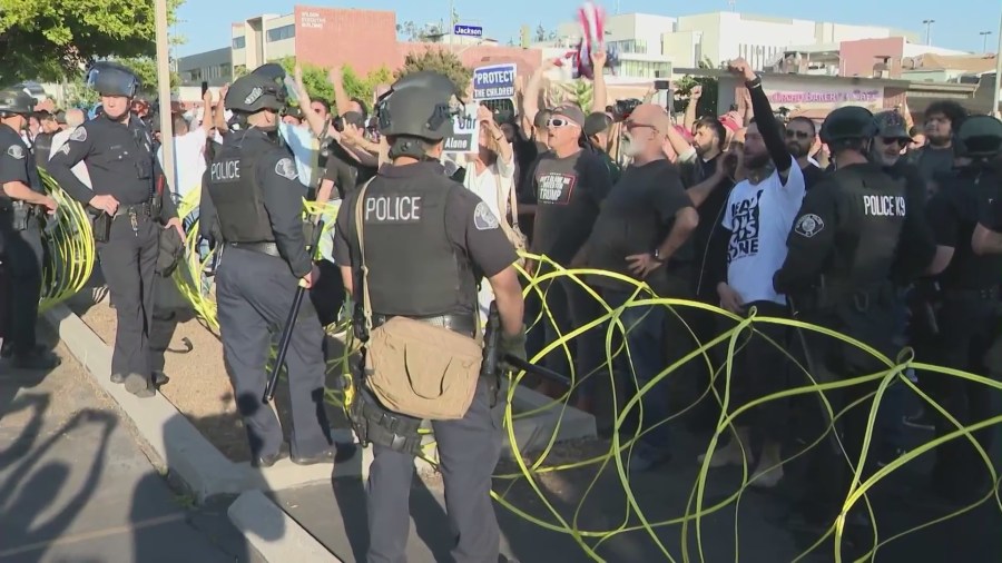 Fights broke out among demonstrators protesting Pride curriculum outside a Glendale school board meeting on June 20, 2023. (KTLA)