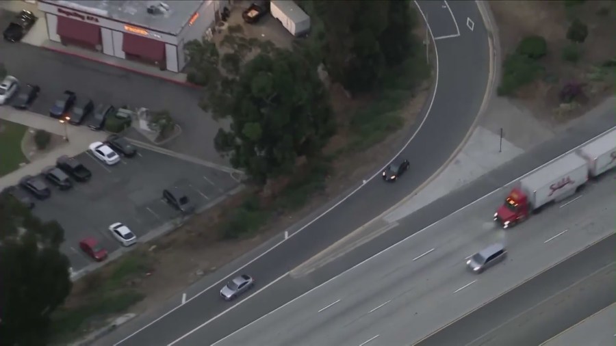 Locals are fed up with a dangerous 57 Freeway onramp in San Dimas that sees cars continually rolling over and crashing into a parking lot below. (KTLA)