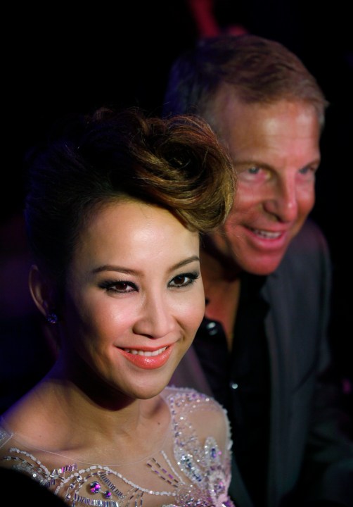 FILE - Hong Kong's pop diva Coco Lee, left, smiles with her husband, Bruce Rockowitz, president of Li & Fung Ltd., during their wedding banquet at Shaw Studio in Hong Kong, China, Friday, Oct. 28, 2011. Coco Lee, a Hong Kong-born singer who had a highly successful career in Asia, died on Wednesday, July 5, 2023. She was 48. (AP Photo/Kin Cheung, File)