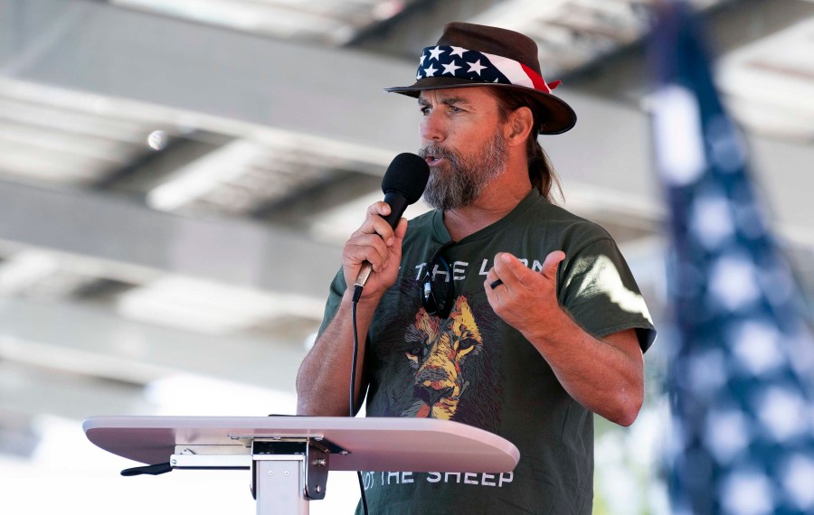 FILE - Alan Hostetter speaks during a pro-Trump election integrity rally he organized at the Orange County Registrar of Voters offices in Santa Ana, Calif., Nov. 9, 2020. A former California police chief was convicted on Thursday, July 13, 2023, of joining the riot at the U.S. Capitol with a hatchet in his backpack and plotting to stop Congress from certifying President Joe Biden's 2020 electoral victory. A judge in Washington's federal court heard testimony without a jury before convicting Hostetter, a right-wing activist and vocal critic of COVID-19 restrictions who defended himself at his bench trial with help from a standby attorney. (Paul Bersebach/The Orange County Register via AP, File)