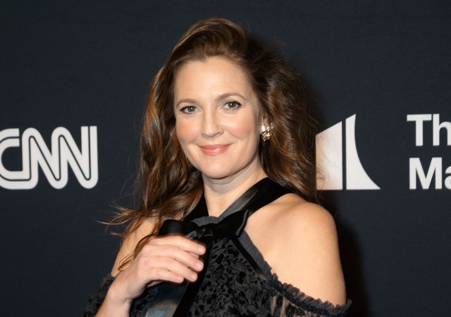 Drew Barrymore appears at the 24th Annual Mark Twain Prize for American Humor at the Kennedy Center for the Performing Arts on March 19, 2023, in Washington. Barrymore will host the National Book Awards, where Oprah Winfrey will be a guest speaker. (AP Photo/Kevin Wolf, File)