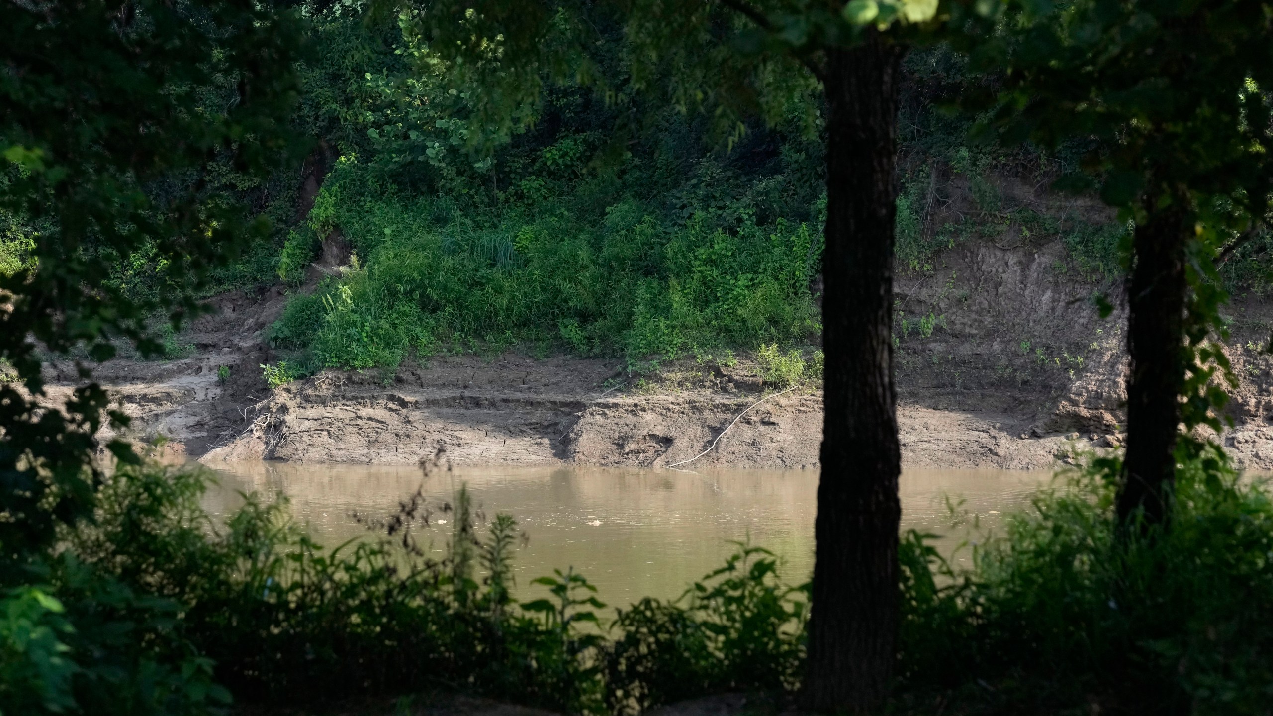 Graball Landing, the spot where Emmett Till's body was pulled from the Tallahatchie River just outside of Glendora, Miss., is photographed Monday, July 24, 2023. President Joe Biden is expected to create a national monument honoring Till, the Black teenager from Chicago who was abducted, tortured and killed in 1955 in Mississippi, and his mother Mamie Till-Mobley. Altogether, the Till national monument will include 5.7 acres of land and two historic buildings. The Mississippi sites are Graball Landing and the Tallahatchie County Second District Courthouse, where Emmett’s killers were tried. (AP Photo/Rogelio V. Solis)