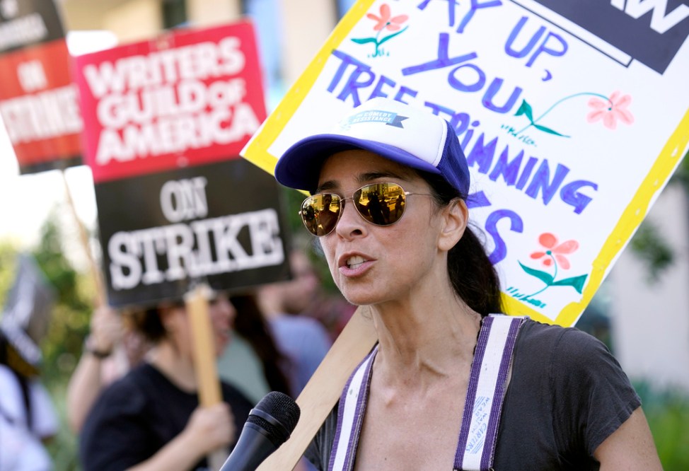 Sarah Silverman walks on a picket line outside Netflix studios on Wednesday, July 26, 2023, in Los Angeles. The actors strike comes more than two months after screenwriters began striking in their bid to get better pay and working conditions. (AP Photo/Chris Pizzello)