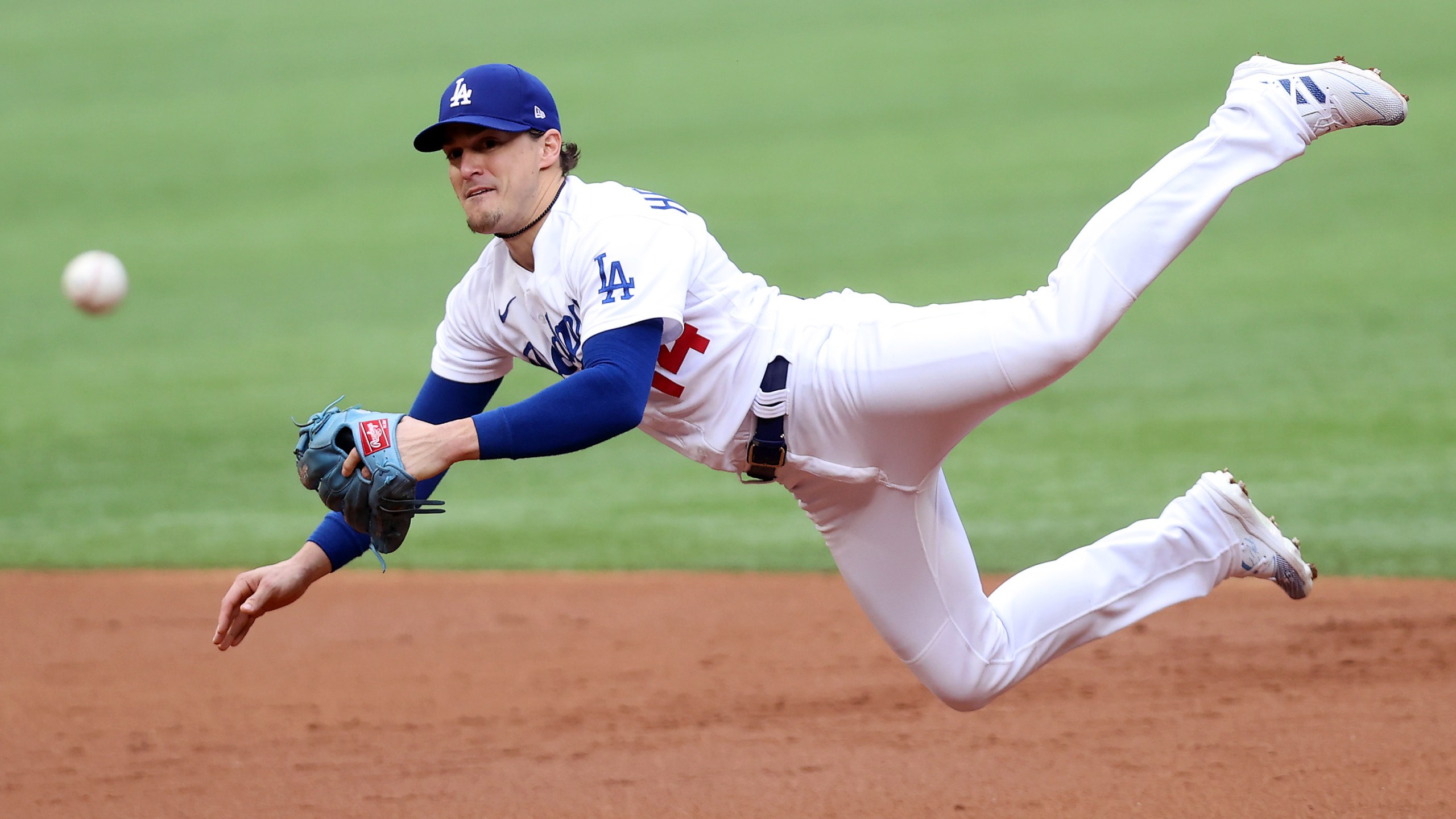 Enrique Hernandez attempts to throw out the runner against the Atlanta Braves during the second inning in Game Six of the National League Championship Series at Globe Life Field on Oct. 17, 2020 in Arlington, Texas. (Getty Images)