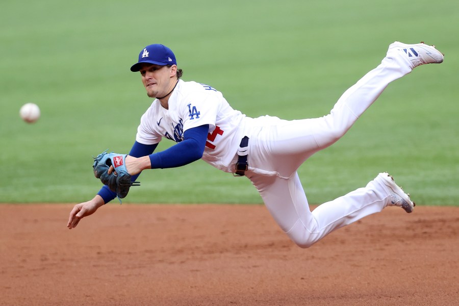 Enrique Hernandez attempts to throw out the runner against the Atlanta Braves during the second inning in Game Six of the National League Championship Series at Globe Life Field on Oct. 17, 2020 in Arlington, Texas. (Getty Images)