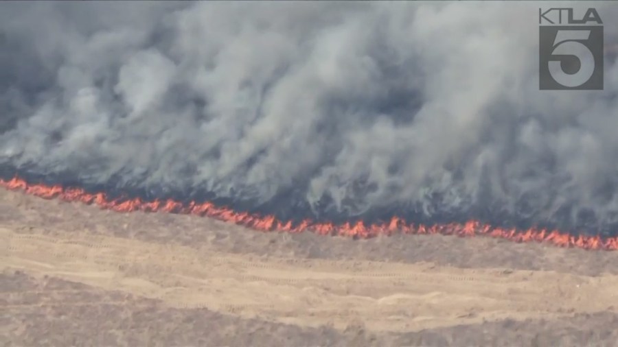 Firefighters are responding to a wildfire that erupted in Moreno Valley on July 14, 2023. (KTLA)