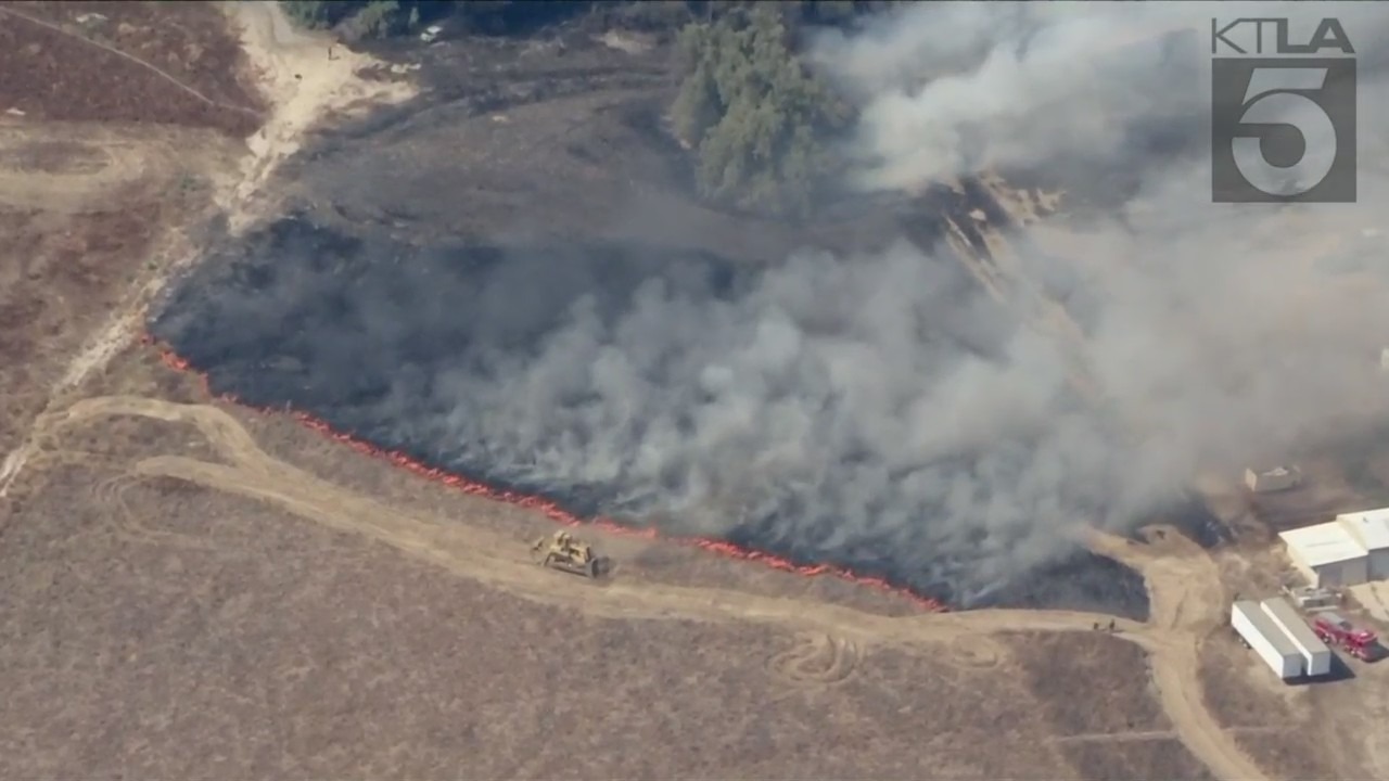 Firefighters are responding to a wildfire that erupted in Moreno Valley on July 14, 2023. (KTLA)