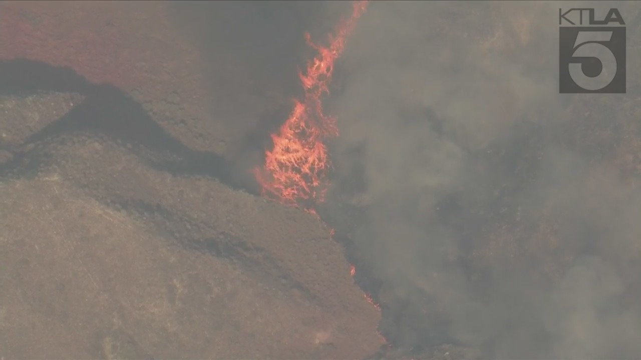 Firefighters are responding to a wildfire that erupted in Moreno Valley on July 14, 2023. (KTLA)