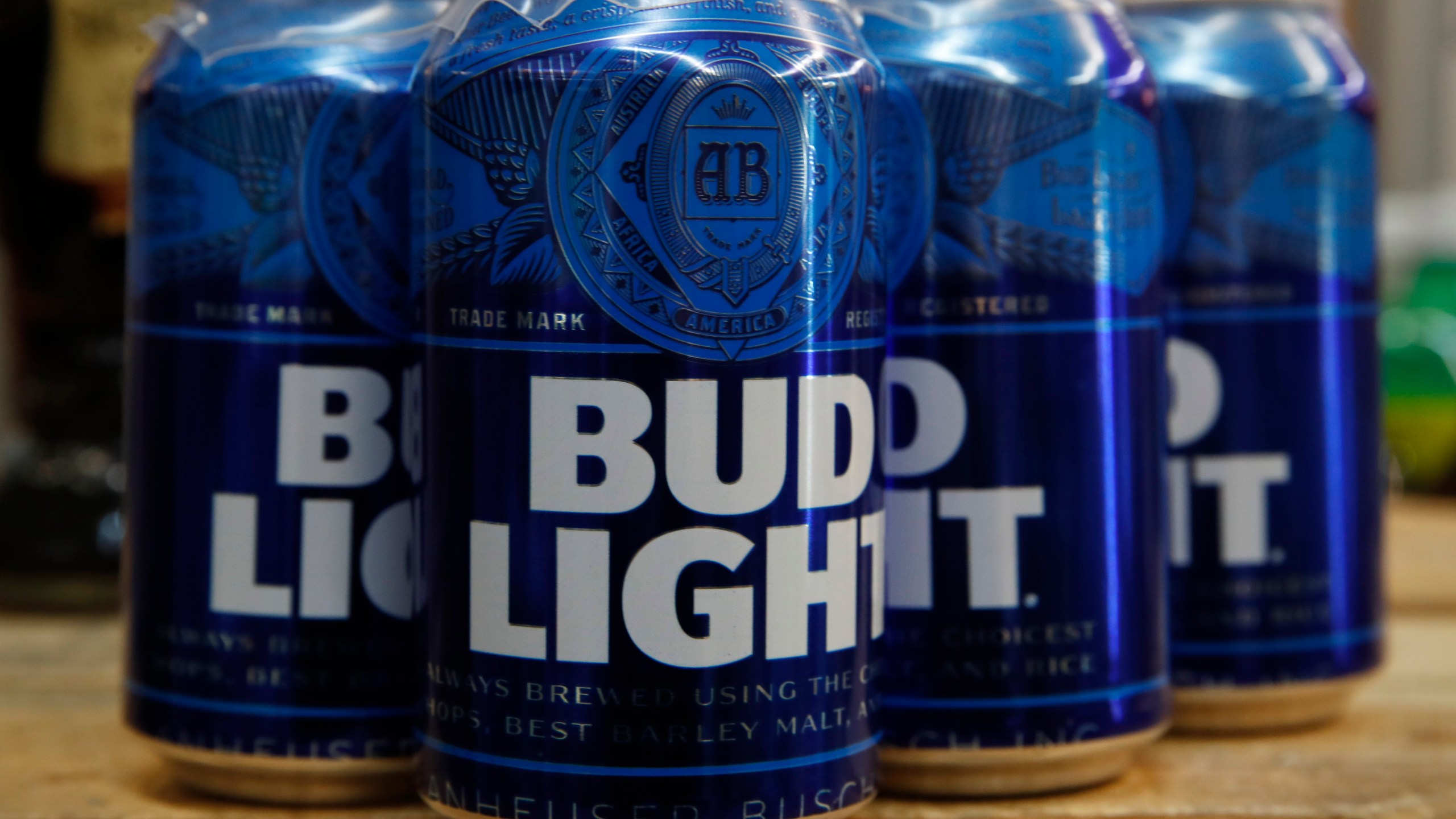 FILE - Cans of Bud Light beer are seen, Thursday Jan. 10, 2019, in Washington. On Friday, April 7, 2023, Anheuser-Busch InBev has reported a drop in U.S. revenue in the second quarter as Bud Light sales plunged amid conservative backlash over a campaign with transgender influencer Dylan Mulvaney. (AP Photo/Jacquelyn Martin, File)