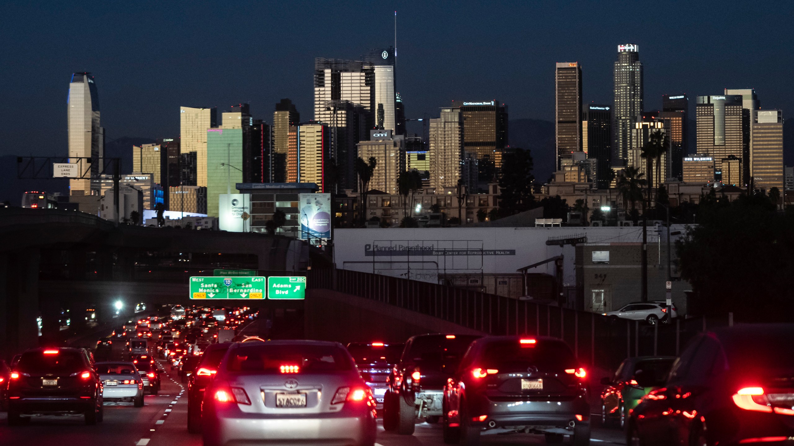 File - Traffic moves along the 110 Freeway in Los Angeles, Tuesday, Nov. 22, 2022. If the auto industry boosts electric vehicle sales to the level the Environmental Protection Agency recommends, any reduction in pollution could prove more modest than the agency expects. The Associated Press has estimated that nearly 80% of vehicles being driven in the U.S. — more than 200 million — would still run on gasoline or diesel fuel. (AP Photo/Jae C. Hong, File)