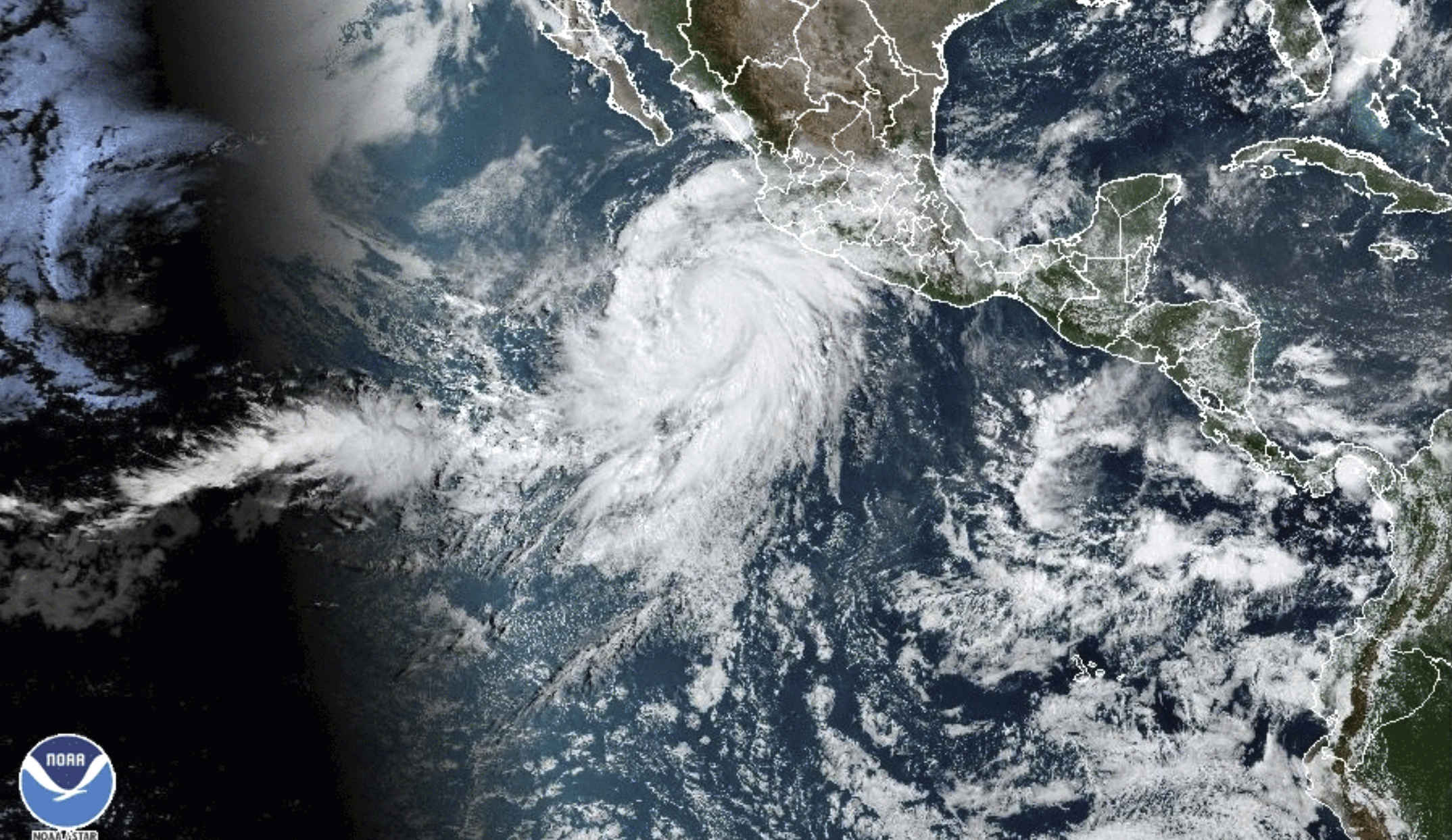 This satellite image taken at 10:50am EDT on Thursday, Aug. 17, 2023, and provided by the National Oceanic and Atmospheric Administration (NOAA) shows Hurricane Hilary off the Pacific coast of Mexico. (NOAA via AP)