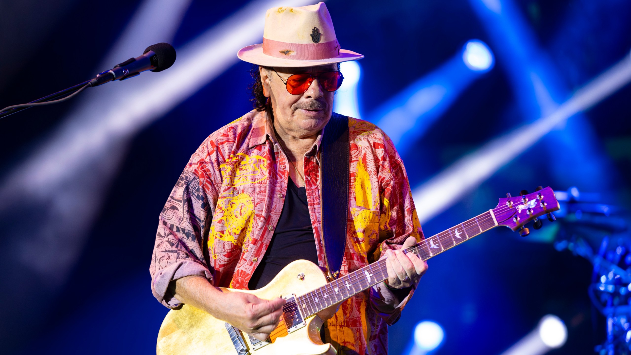 Carlos Santana, of the band Santana, performs Friday, June 30, 2023, at Ravinia in Highland Park, Ill. (Photo by Rob Grabowski/Invision/AP)