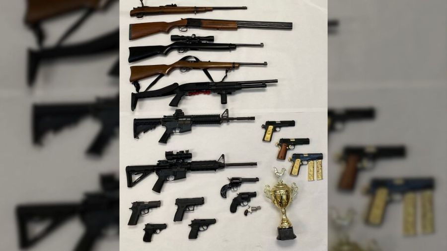 The Riverside County Sheriff's Department provided this photo of 17 guns they say were illegally owned and seized on Aug. 9, 2023.