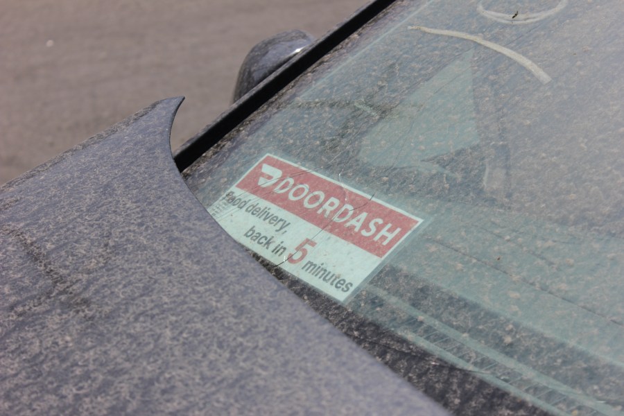 A DoorDash sticker is shown in the window of a vehicle that struck the Wang family in Los Angeles on June 7, 2023.