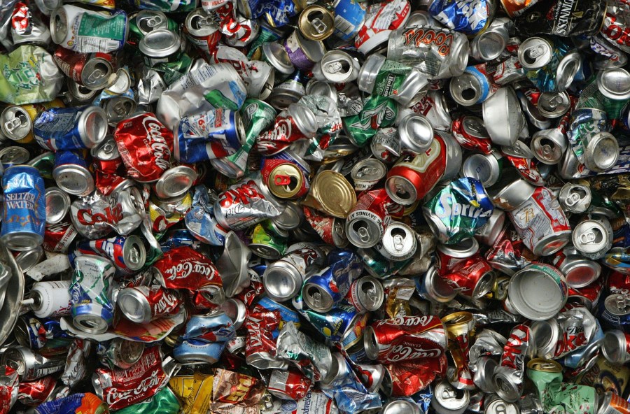 Recycled aluminum cans are seen at the Norcal Waste recycling facility July 11, 2003 in San Francisco. The most modern recycling facility in the United States opened in March of 2003 and has the ability to sort and bail up to 2,100 tons of recyclables per day using an efficient combination of specialized equipment and hand sorting. Along with paper, plastic and glass, Norcal's newly opened construction materials sorting facility can sort wood, concrete and metal. (Photo by Justin Sullivan/Getty Images)