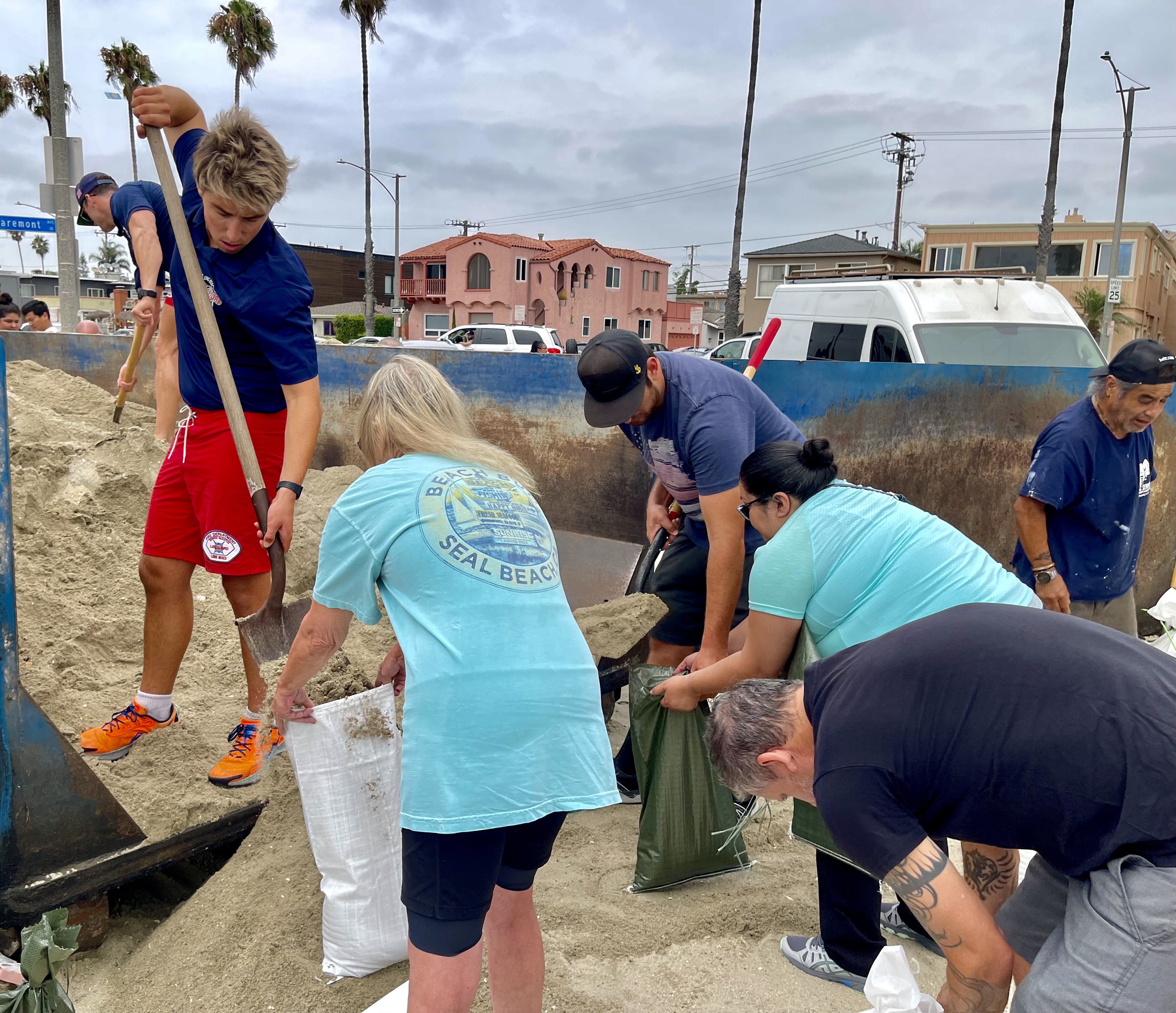 Long Beach residents are seen filling sandbags on August 19, 2023 as coastal communities in SoCal are bracing for potential flooding from Hurricane Hilary. (KTLA)