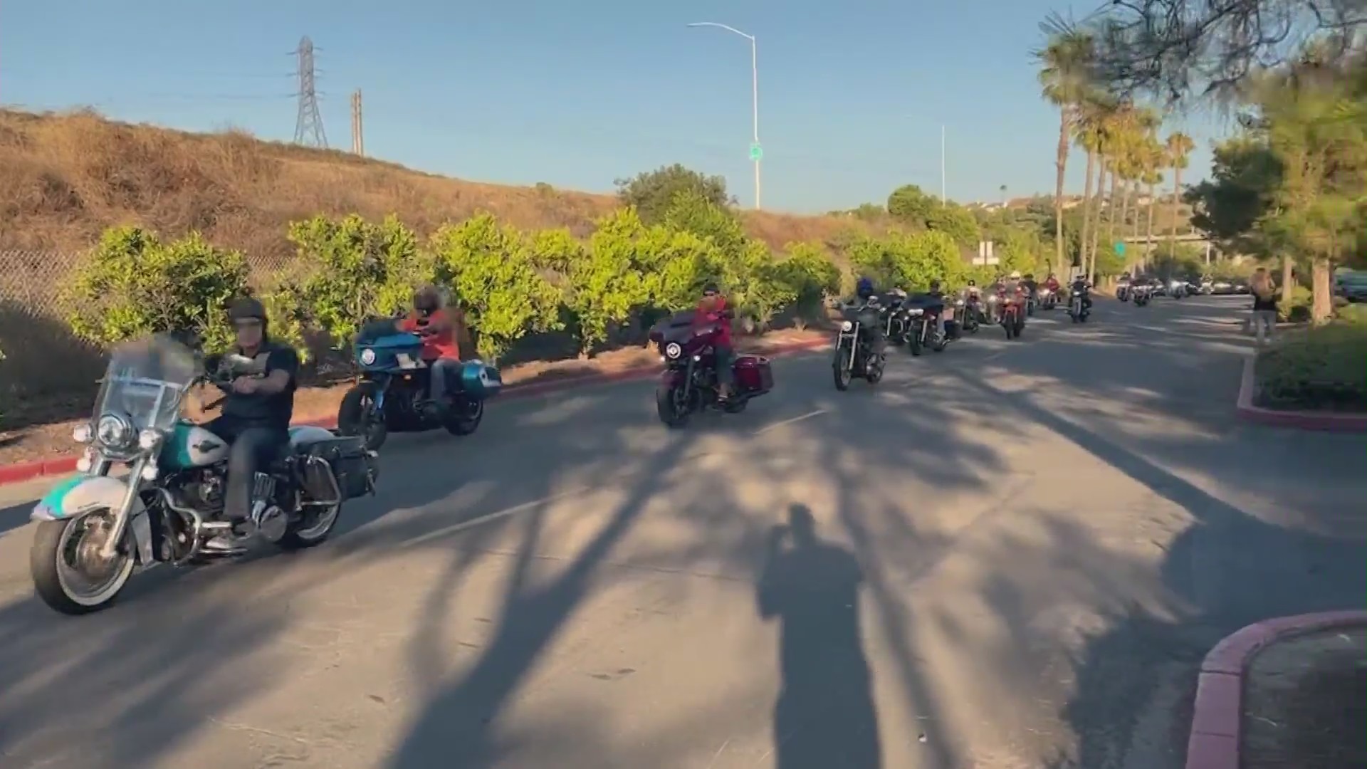 A motorcycle caravan attended a community gathering and prayer held in a Lake Forest church to honor the victims killed in a mass shooting at Cook’s Corner bar on Aug. 25, 2023. (KTLA)