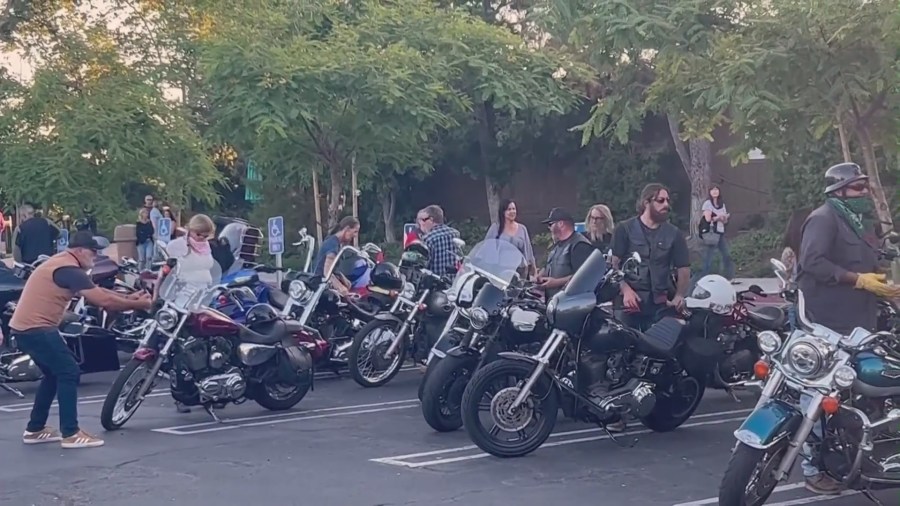 A motorcycle caravan attended a community gathering and prayer held in a Lake Forest church to honor the victims killed in a mass shooting at Cook’s Corner bar on Aug. 25, 2023. (KTLA)