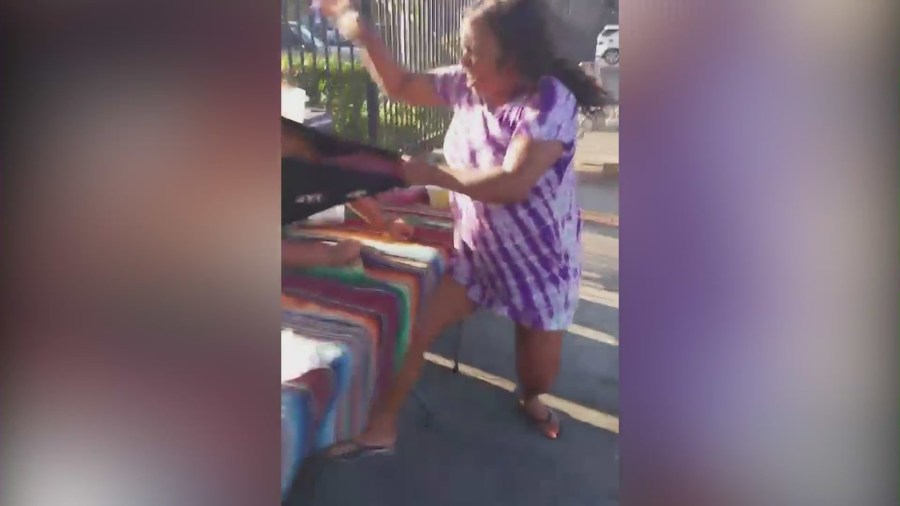 Video captured the moment a taco vendor was violently attacked by a woman who had refused to pay for her food in South Los Angeles on August 6, 2023. (KTLA)