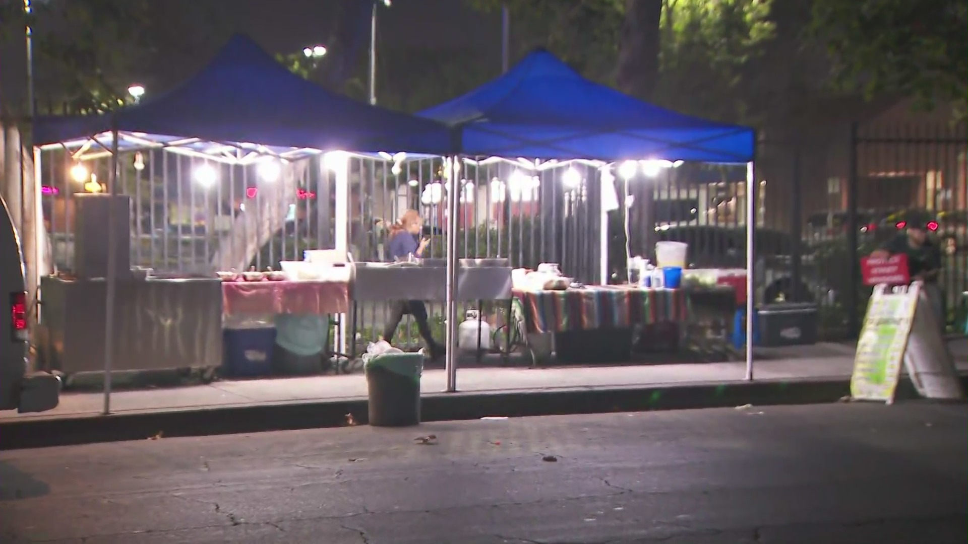 The taco vendor that was victimized seen serving food in South Los Angeles on August 8, 2023.