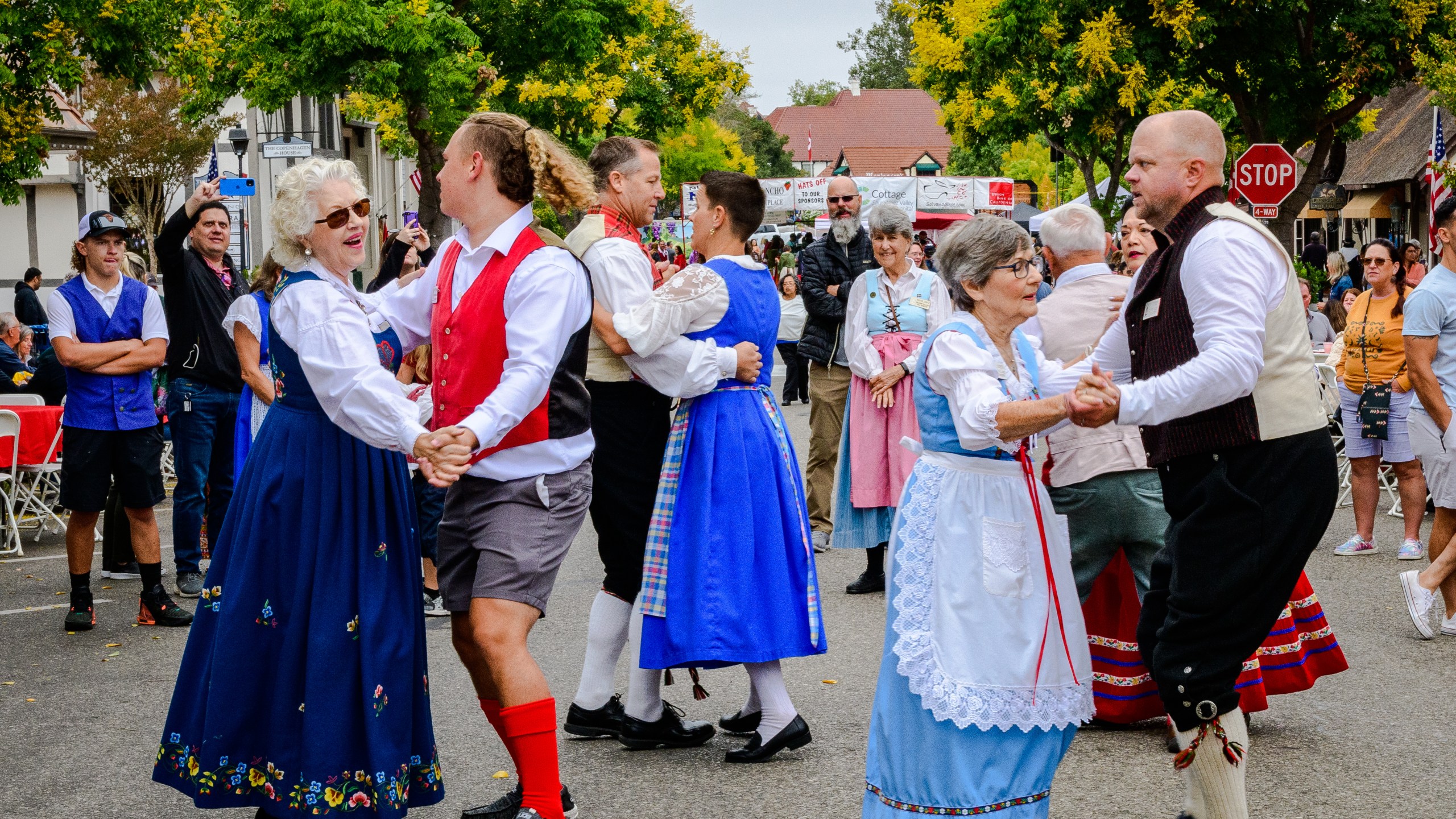 Street performers dance on Copenhagen Drive in downtown Solvang during Danish Days 2022. (Deborah Chadsey Photography)