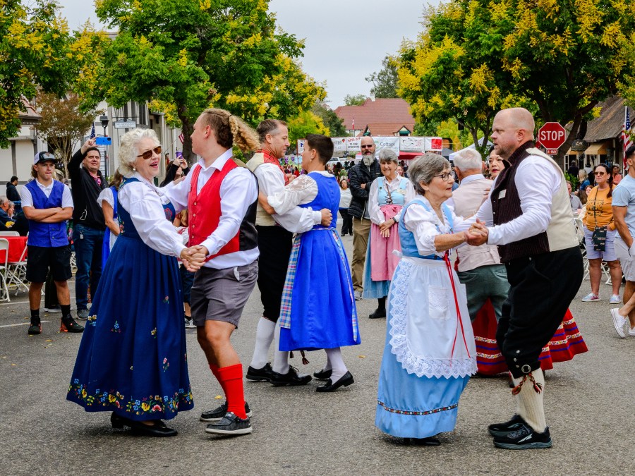 Street performers dance on Copenhagen Drive in downtown Solvang during Danish Days 2022. (Deborah Chadsey Photography)