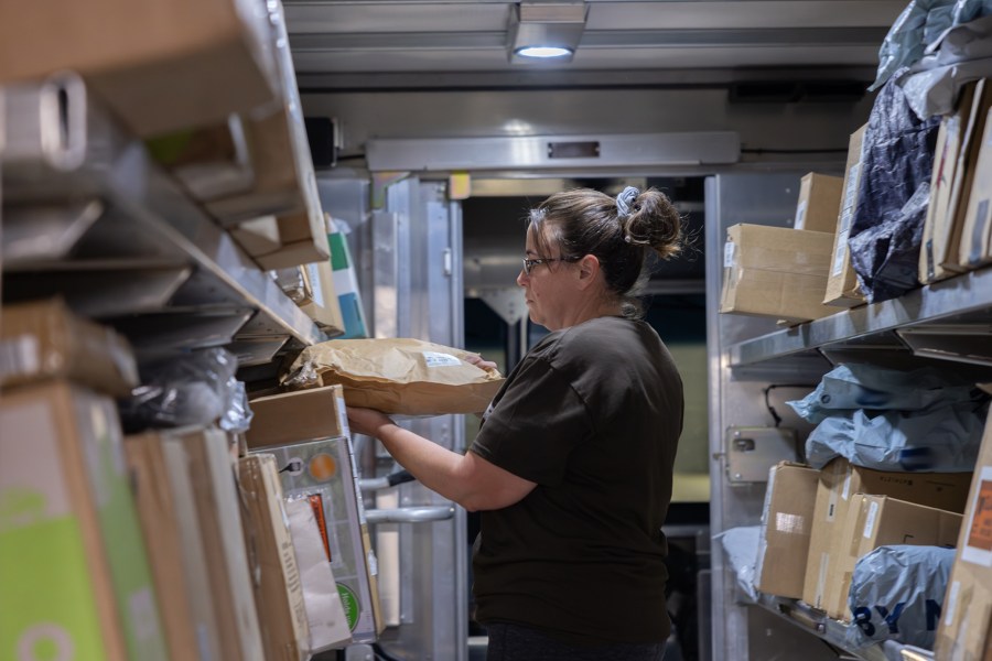 UPS worker delivering packages. (United Parcel Service)