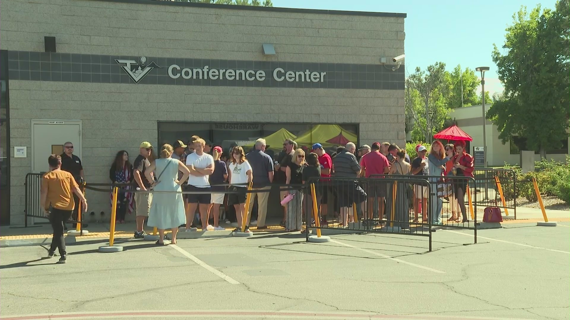 Attendees waiting outside Temecula Valley Unified School District headquarters to secure a chance to speak at a board meeting on a proposed flag-limiting policy on Sept. 12, 2023. (KTLA)