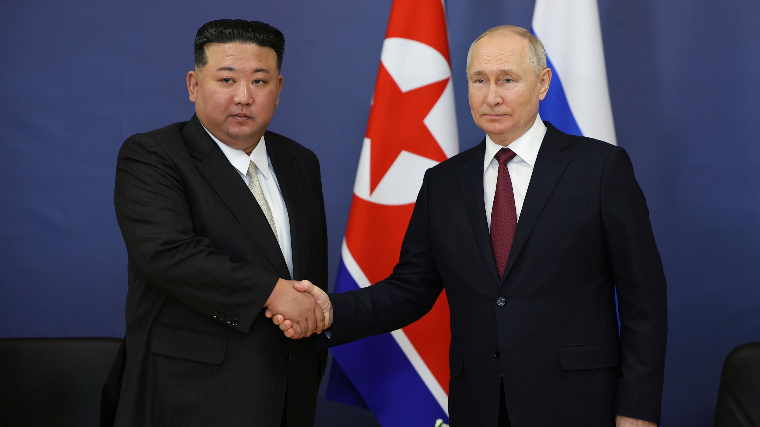 Russian President Vladimir Putin, right, and North Korea's leader Kim Jong Un shake hands during their meeting at the Vostochny cosmodrome outside the city of Tsiolkovsky, about 200 kilometers (125 miles) from the city of Blagoveshchensk in the far eastern Amur region, Russia, on Sept. 13, 2023. (Vladimir Smirnov, Sputnik, Kremlin Pool Photo via AP, File)