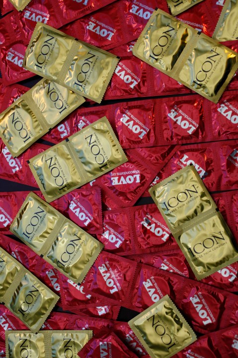 FILE - A sample of condoms distributed freely by the AIDS Healthcare Foundation is displayed at a news conference on Feb. 14, 2023, in Los Angeles. On Sunday, Oct. 8, 2023, California Gov. Gavin Newsom vetoed a bill that would have required free condoms be made available to all public high school students. (AP Photo/Damian Dovarganes, File)