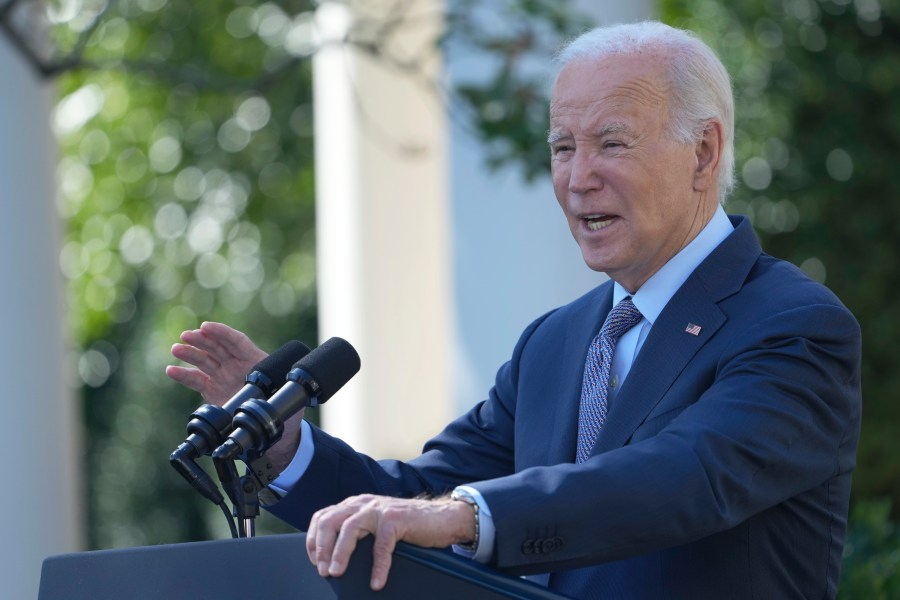 President Joe Biden speaks in the Rose Garden of the White House in Washington, Wednesday, Oct. 11, 2023, about efforts to eliminate hidden junk fees. The Federal Trade Commission on Wednesday proposed a rule to ban any hidden and bogus junk fees, which can mask the total cost of concert tickets, hotel rooms and utility bills. (AP Photo/Susan Walsh)