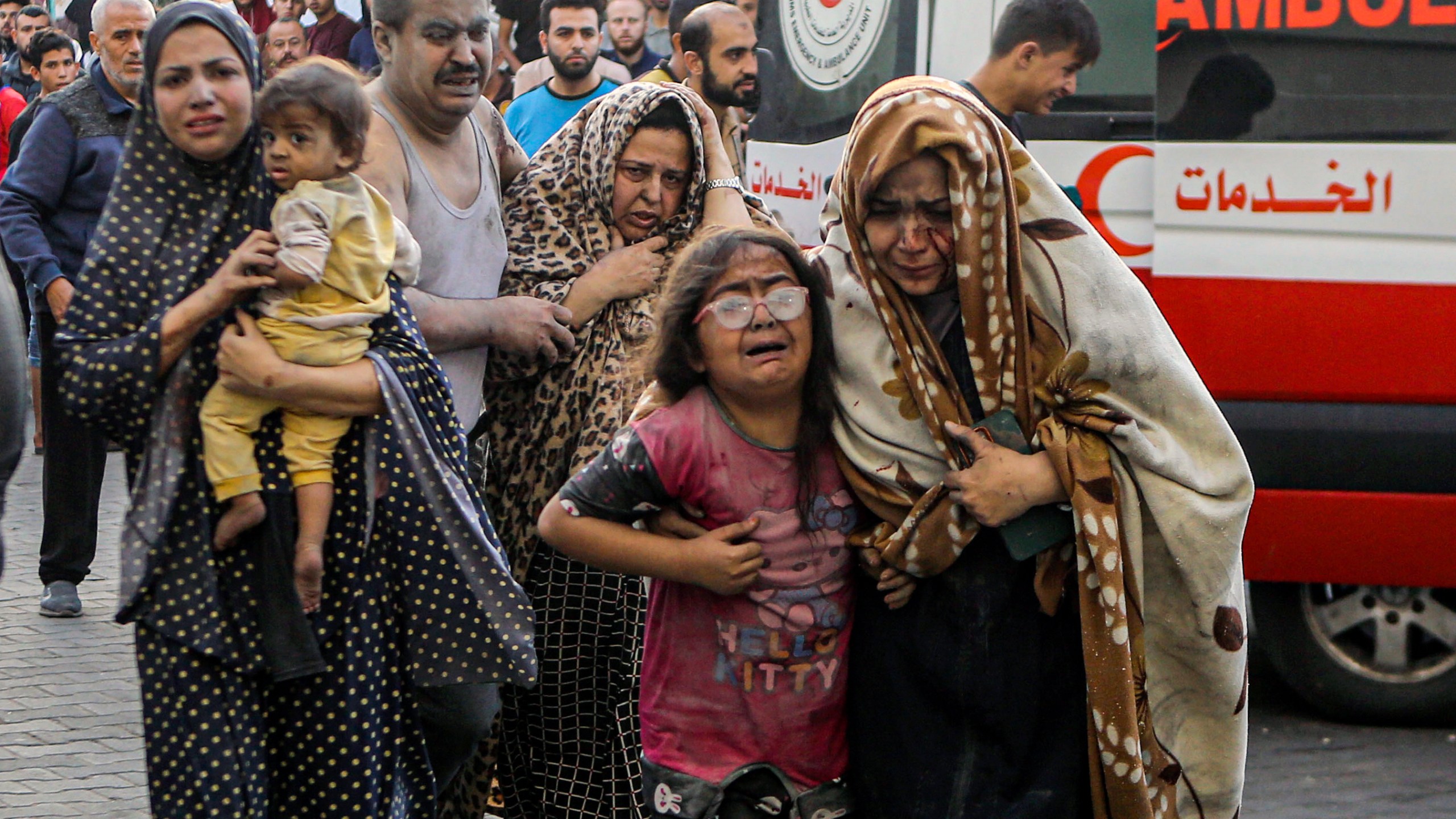 Wounded Palestinians arrive to al-Shifa hospital, following Israeli airstrikes on Gaza City, central Gaza Strip, Monday, Oct. 16, 2023. (AP Photo/Abed Khaled)