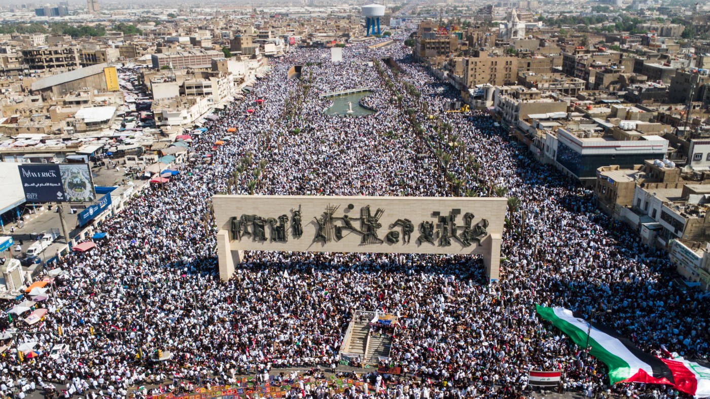 Iraqis hold a mass rally supporting the Palestinians in the Gaza Strip on Friday, Oct. 13, 2023, in Baghdad, Iraq. (AP Photo/Anmar Khalil)