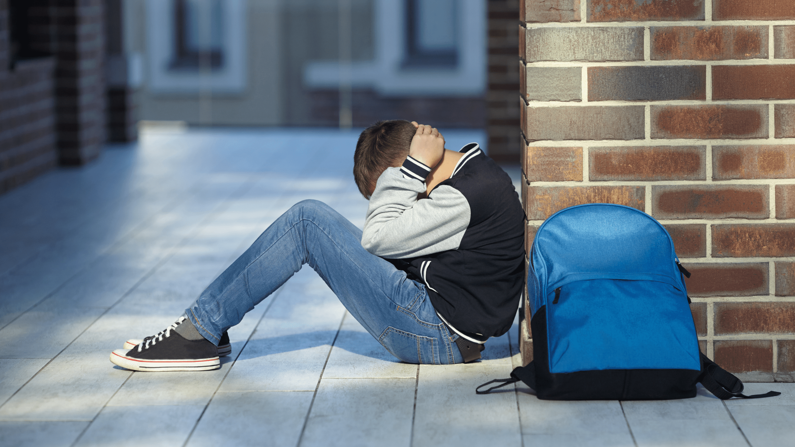 File image of a boy in the hallway of a school.