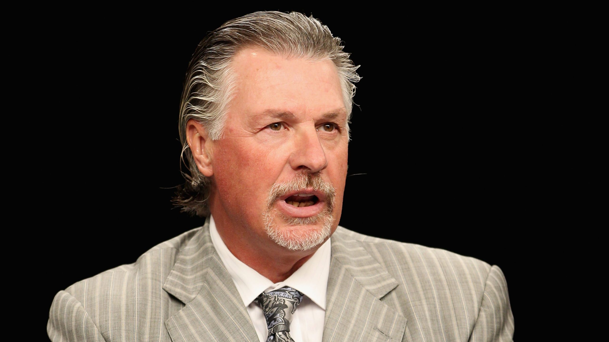 Hockey Analyst Barry Melrose speaks on set during a NHL Network broadcast during the 2012 NHL All-Star Game Player Media Availability at the Westin Ottawa on January 27, 2012 in Ottawa, Ontario, Canada. (Getty Images)