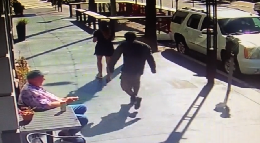 Sexual assault of woman by homeless man caught on cameras